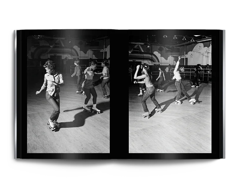 Black and white photo book spread of people roller skating indoors on wooden floor