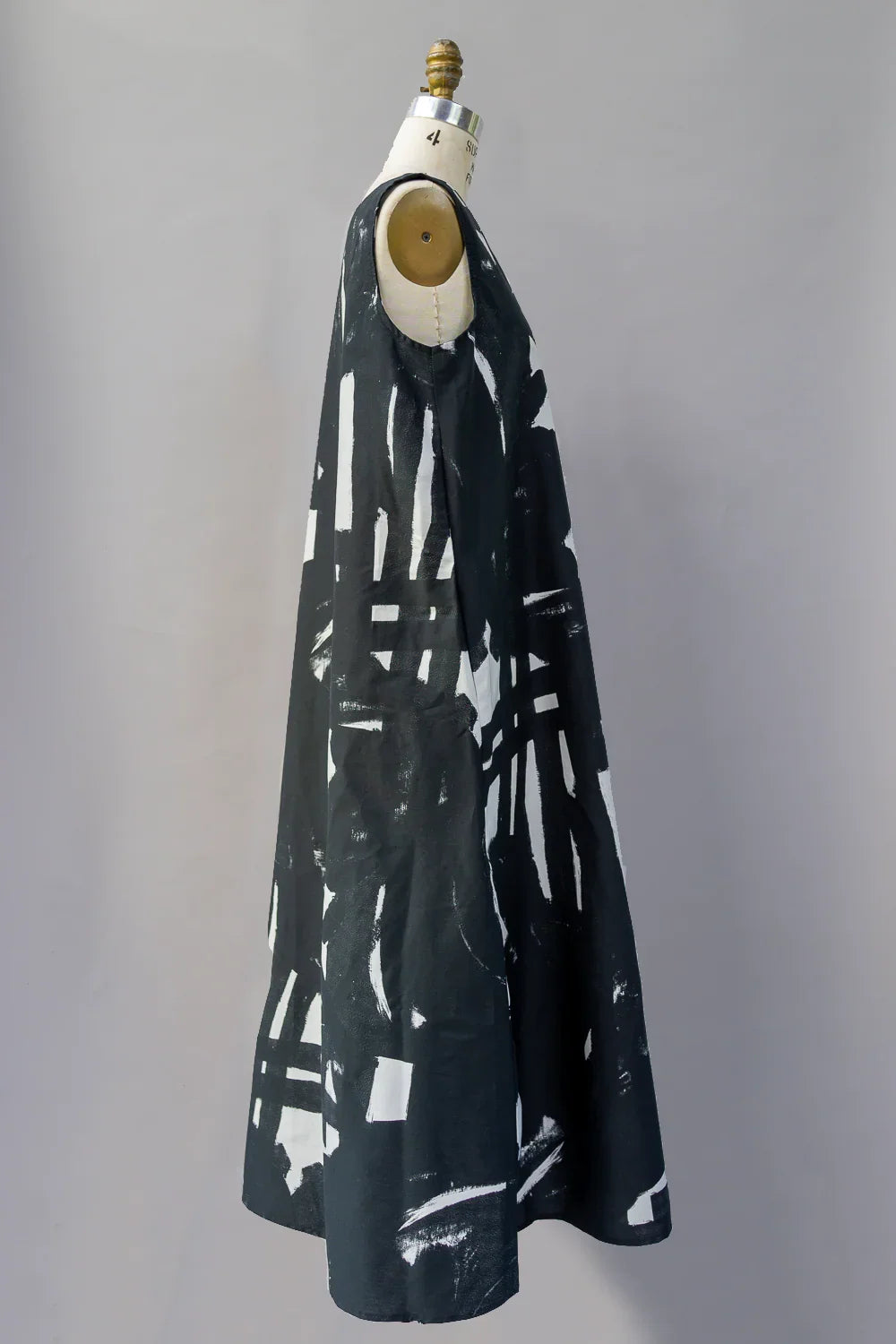 Sleeveless black and white printed long mu'umu'u dress on mannequin