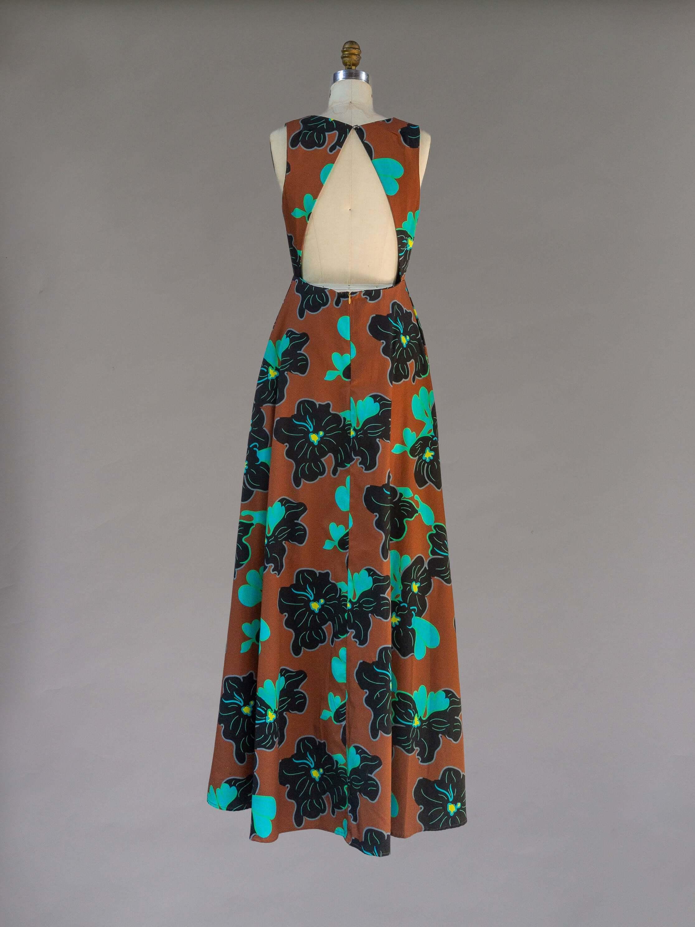 Origami Dress 1961 Chestnut featuring a deep plunge front and open back, showcasing vintage 70s glamour.