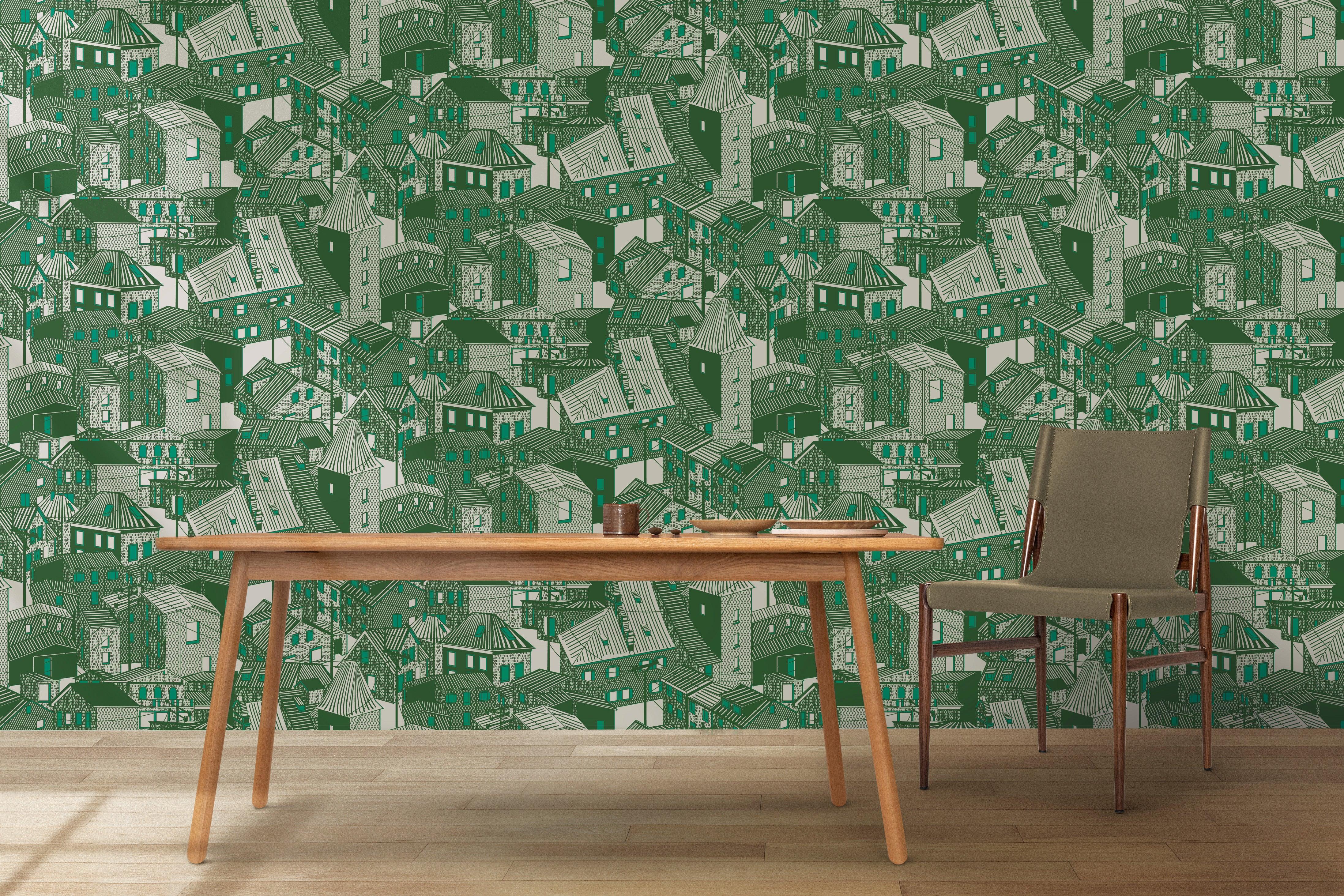 Green and white wallpaper with abstract house pattern, modern desk and chair in foreground