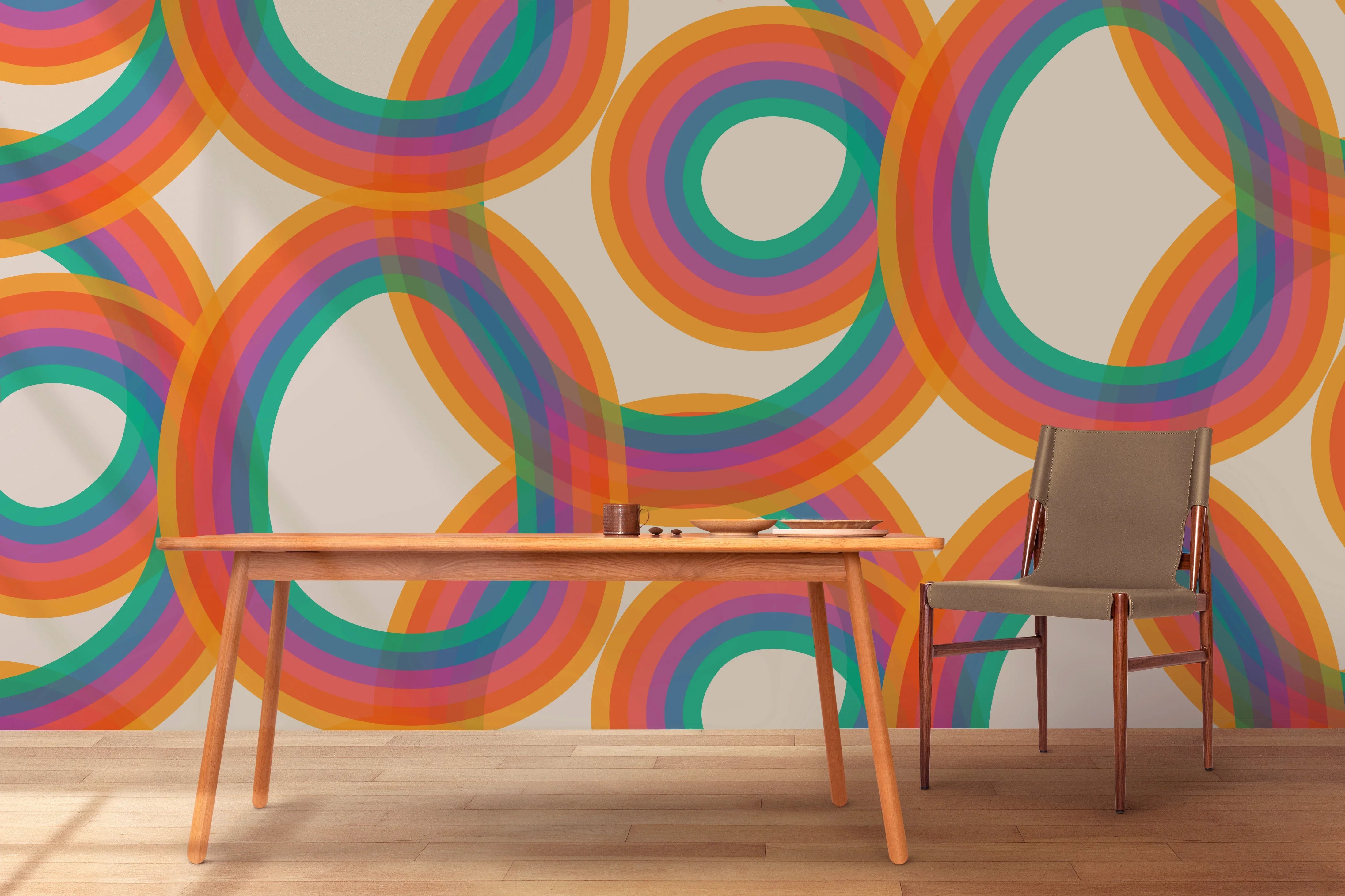 Modern interior with wooden table, chair, and bold rainbow abstract wallpaper