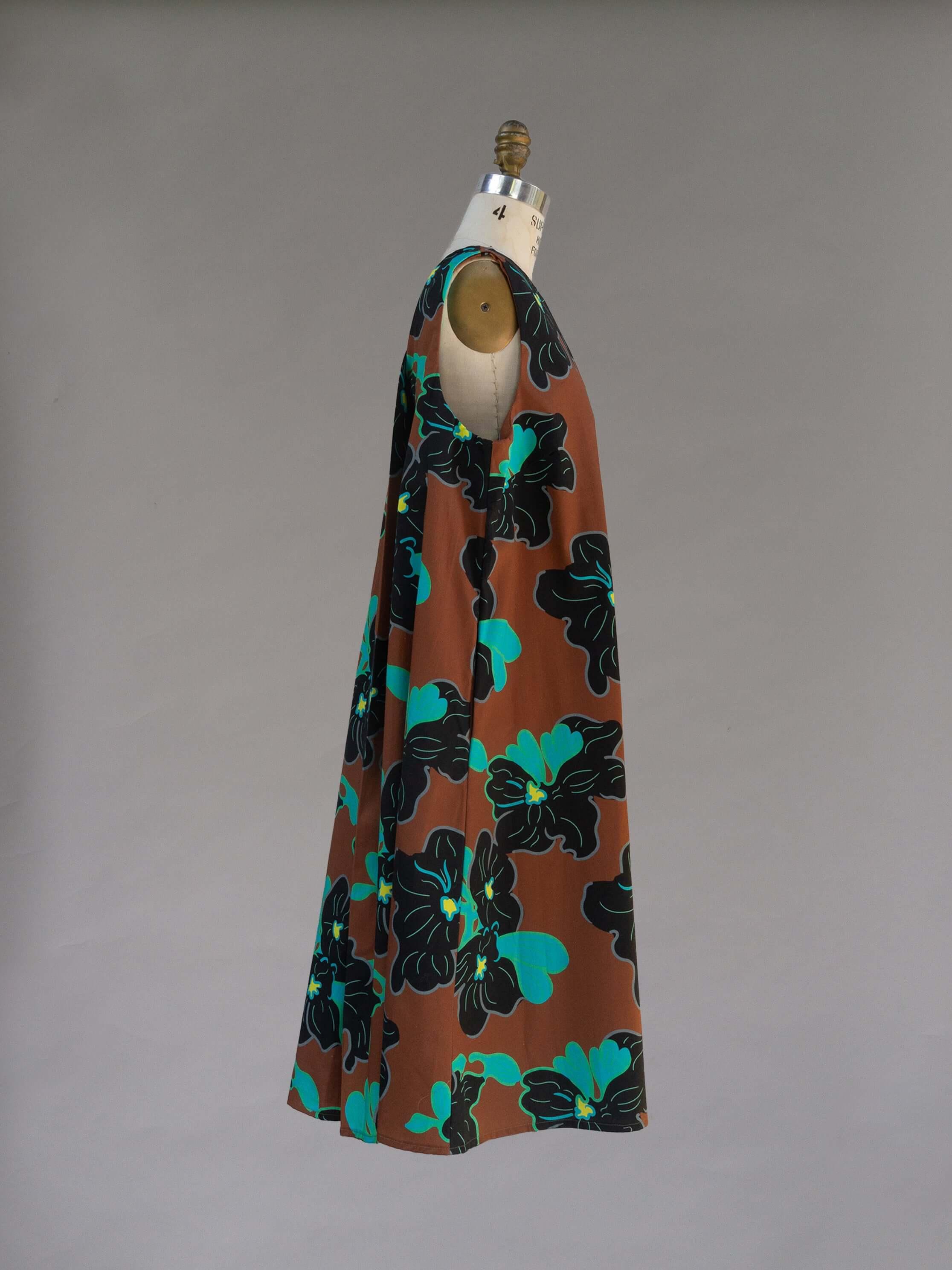 Watteau Dress 1961 Chestnut featuring floral patterns and a modern loose body design.